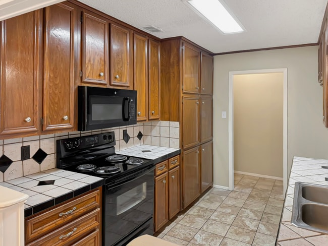 Foto del edificio - 1524 Timber Creek Dr