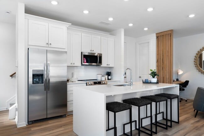 Building Photo - Brand new luxurious townhome steps away fr...