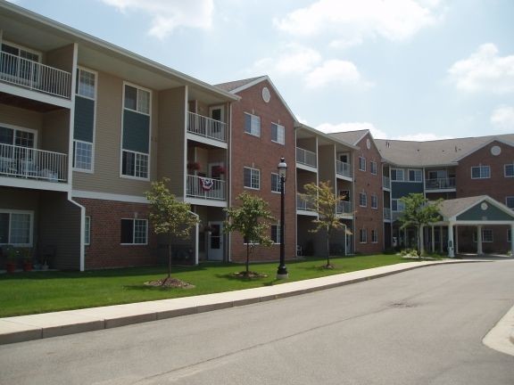 Each apartment has a porch or patio. - Bayberry Farms Village