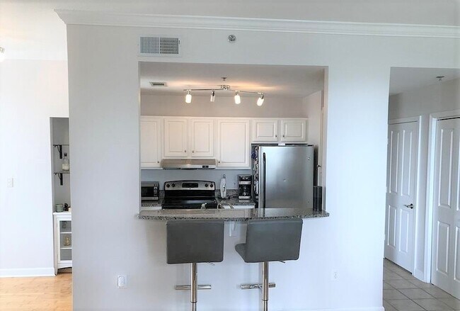 Kitchen with eat-in counter. - 1101 Juniper St NE