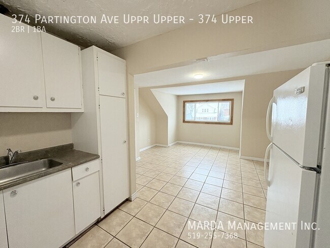 Photo du bâtiment - COZY 2 BED/1 BATH NEAR U OF W - INCLUSIVE!!