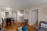 Located at 6601 Dunlap St in Houston, TX, this one-bedroom, one-bathroom unit offers a well-organized single-floor layout that maximizes every square foot. The living room serves as the welcoming centerpiece of the home, featuring warm hardwood flooring, neutral walls, and a sliding glass door that opens to a private outdoor patio, filling the space with natural light and providing a seamless indoor-outdoor connection.

The dining area flows naturally from the living room and sits adjacent to the kitchen, creating an open and functional common area. The galley-style kitchen is efficiently designed with white cabinetry extending to the ceiling, light granite-style countertops, white appliances including a range and refrigerator, and a pass-through peninsula that connects to the dining space. A pantry provides additional storage.

The carpeted bedroom is generously proportioned, offering a ceiling fan and access to multiple closets, including a walk-in, ensuring ample storage. A hallway lined with additional closets leads to the full bathroom, which features a tub-shower combination with white tile surround, a granite-topped vanity, and hardwood flooring. Three closets throughout the unit offer practical storage solutions for everyday living.