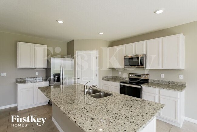 Building Photo - 5776 Arlington River Dr.