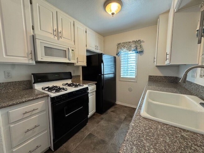 Foto del edificio - Beautiful & Private Condo in the Sought-After Terra Vista Community