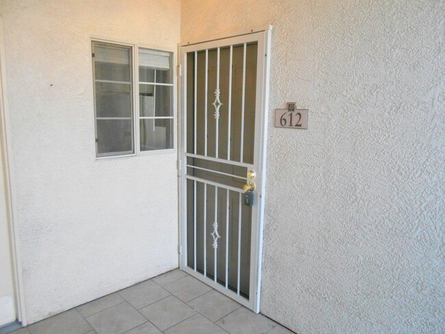 Building Photo - Spacious 3 bedroom Condo w/Garage and Gate...