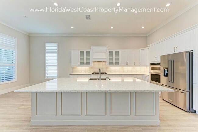 Building Photo - STUNNING 4 BEDROOM POOL HOME WITHIN THE LA...