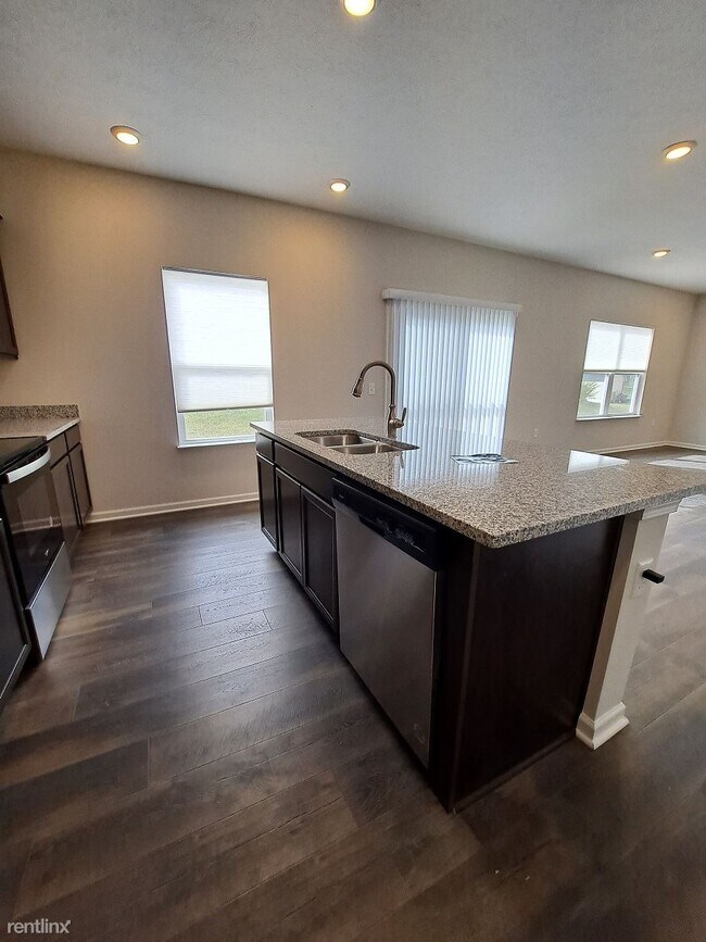 Foto del edificio - 4 br, 2.5 bath House - 5160 Buttercup Dr