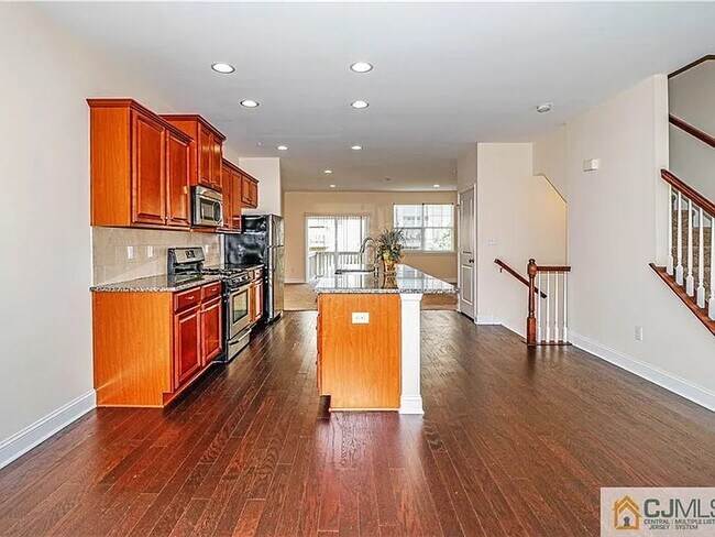 Kitchen and Family Room - 2405 Farmall Ln