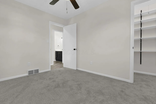 newly remodeled bedrooms all have ceiling fans - 1670 Rainbow Dr NE