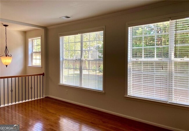 Building Photo - 4668 Creekside Villas Way