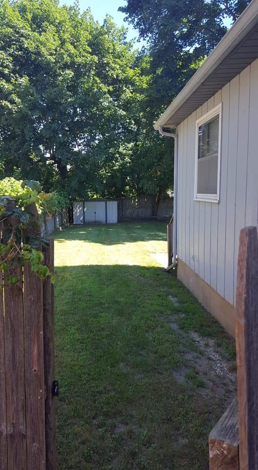 Back yard with privacy fence - 730 McCourtie St