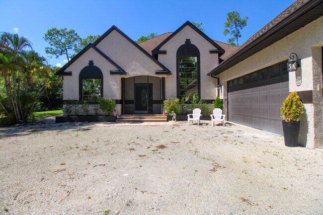 Building Photo - ** GOLDEN GATE ESTATES ** SINGLE FAMILY HOME ** NO HOA SO MOVE IN FAST ** 3 BR\2 BATH PRIVATE HEA...