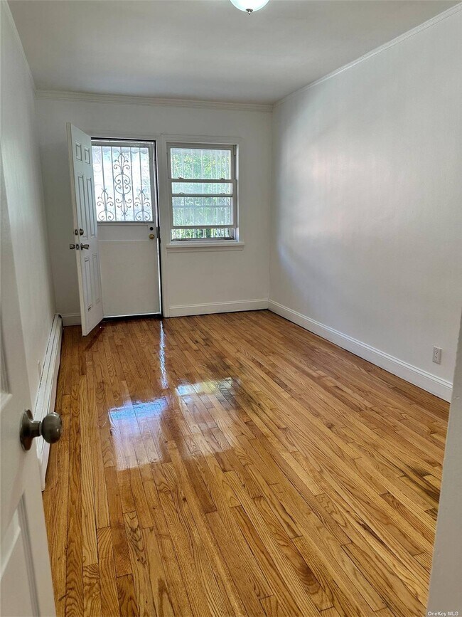 Building Photo - 136-07 59th Ave