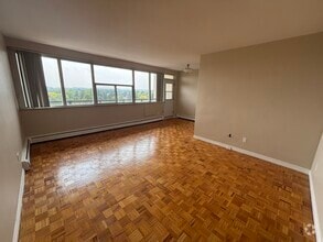 Building Photo - 1061 Queen's Blvd