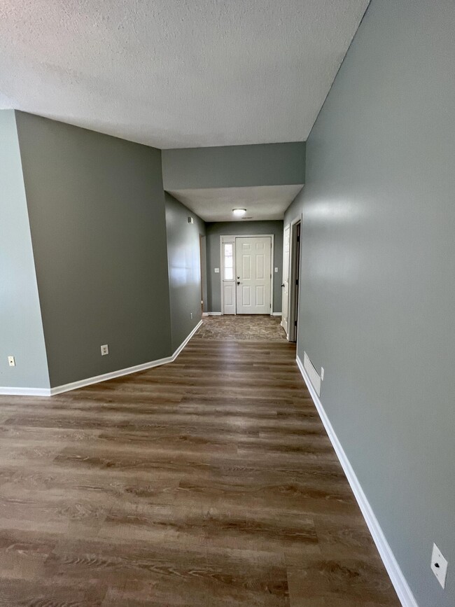 Building Photo - 1202 Squirewood Way