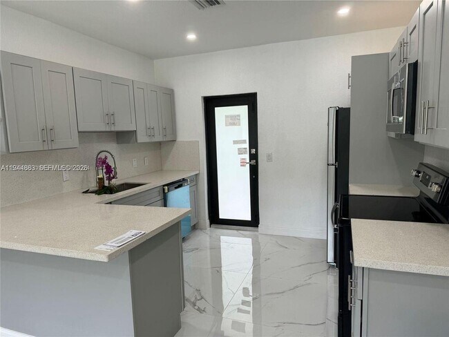 Building Photo - 1210 NW 123rd St