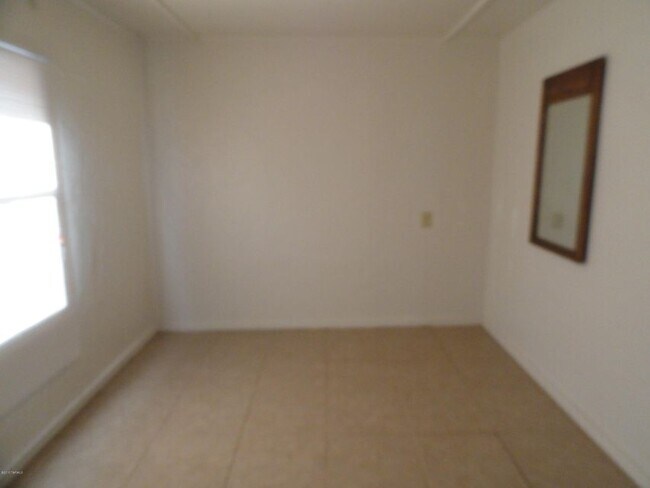 Building Photo - 5159 S 13th Ave