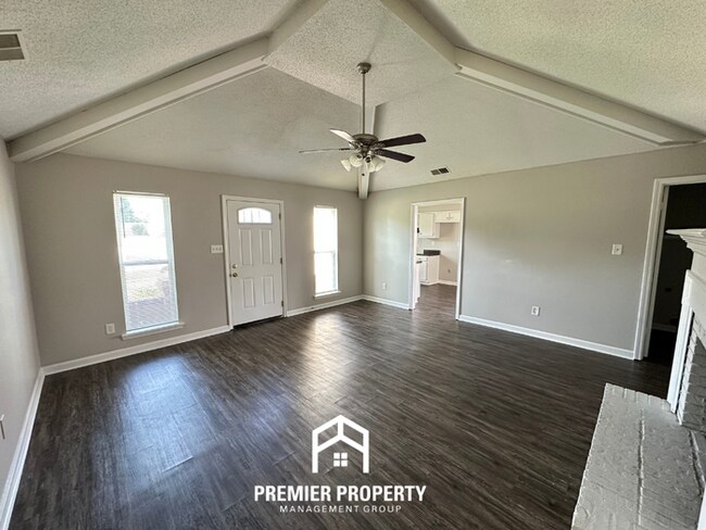 Building Photo - Charming 3BR/2BA Near Southwind | High Vaulted Ceilings, Hardwood Floors & Fireplace