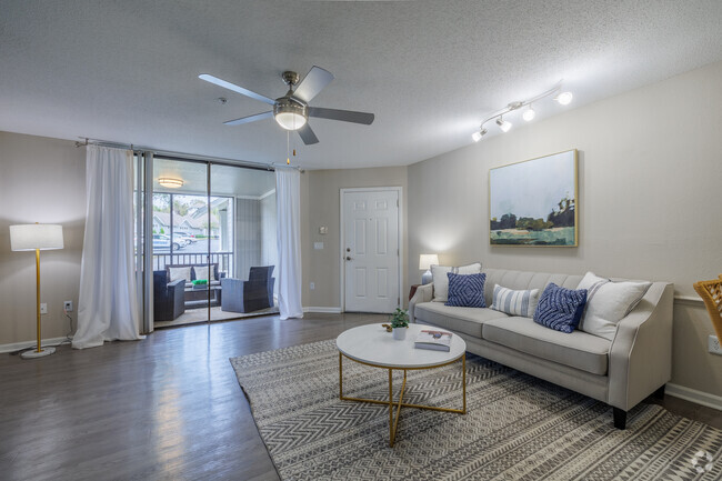 The Monroe - Model Living Room - The Monroe Apartment Homes