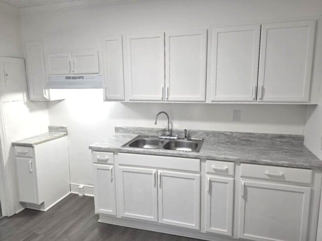 Building Photo - For Rent: Renovated Three Bedroom House in...