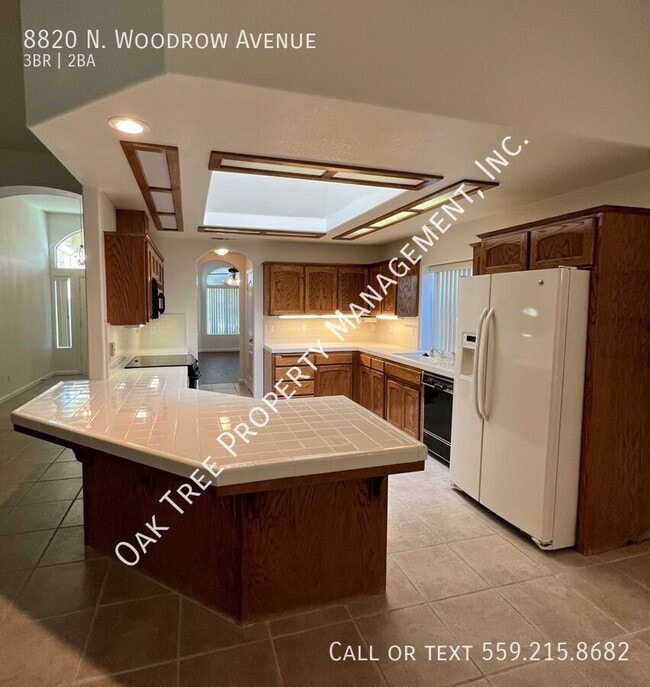 Foto del edificio - 8820 N Woodrow Ave