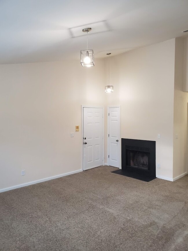 Upstairs Garden Front Door and Fireplace - Lake Princess Anne Apartments