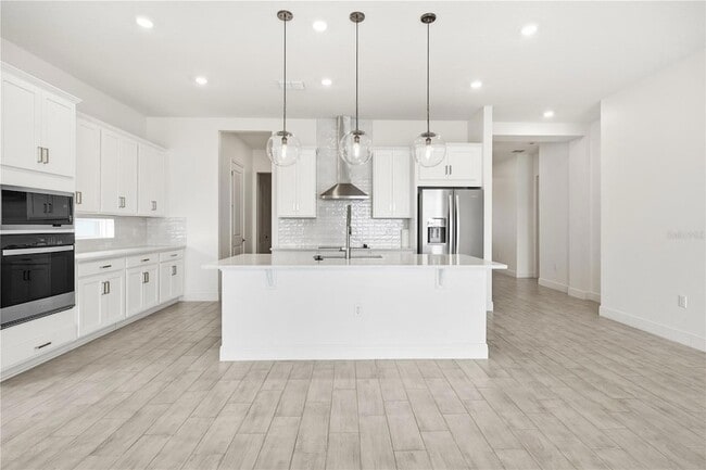 Foto del edificio - 13589 McMillan Dr