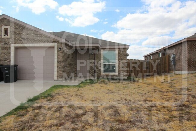 Building Photo - 907 Lasso Dr.