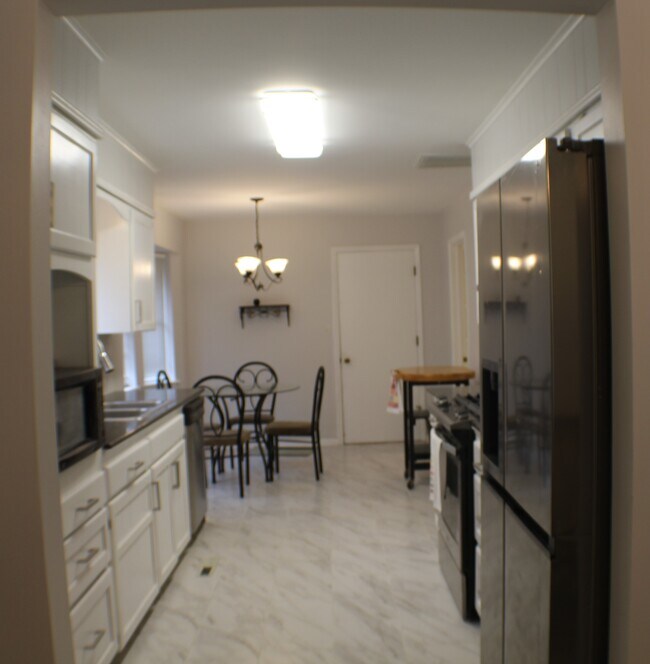 Kitxhen with Breakfast Nook - 11127 E 29th St