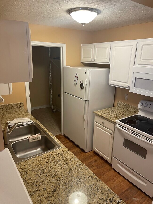 Kitchen to laundry view - 7311 Chatham Ct