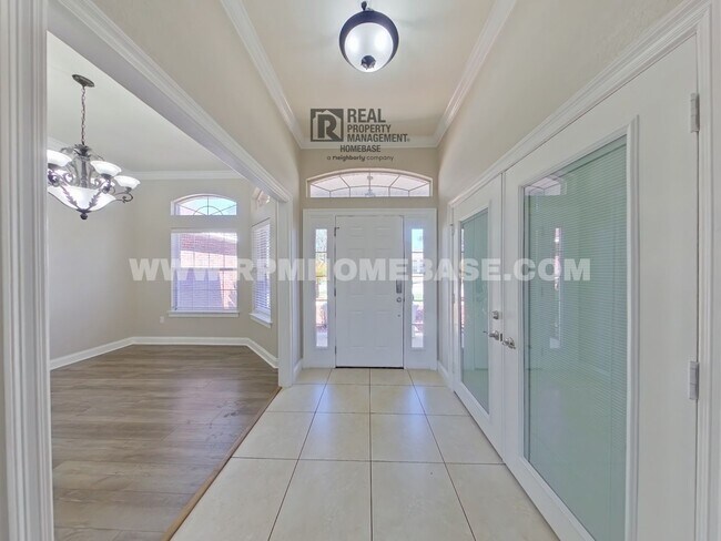 Building Photo - ELEGANT 4/3 + OFFICE IN GATED CHANAN ESTATES | Gas Fireplace + Formal Dining!