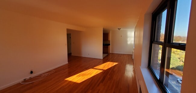 living area with room for a dining table next to the kitchen - 110 Fisher Ave