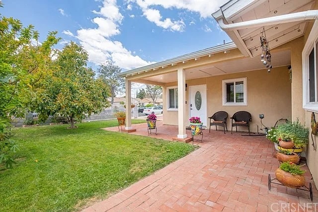 front porch and yard - 8160 Jamieson Ave