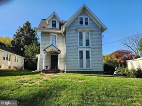 Building Photo - 20 W College Ave