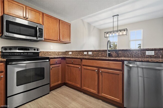 Building Photo - 3 br, 2.5 bath House - 11605 NW 89th St Ap...