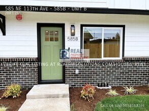Building Photo - 585 NE 113th Ave