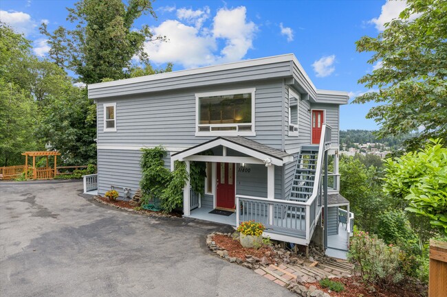 Front entrance with covered porch. - 11800 90th Ave NE