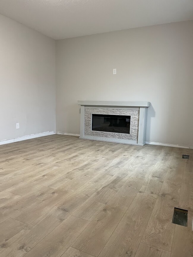 Living room with Electric Fireplace - 2623 College Ave