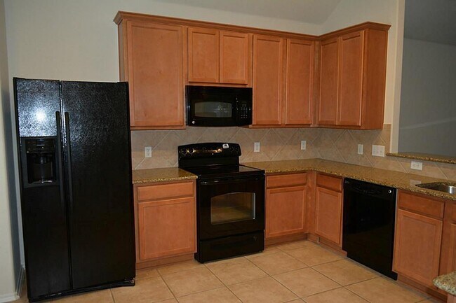 Foto del edificio - 5110 Heatherdawn Ct