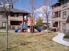 área de juegos para niños - The Plaza at 4th Street Apartments