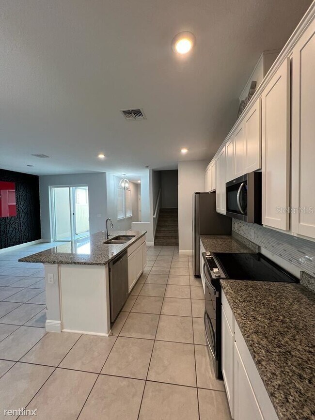 Foto del edificio - 3 br, 2.5 bath Townhome - 9760 Amber Chest...