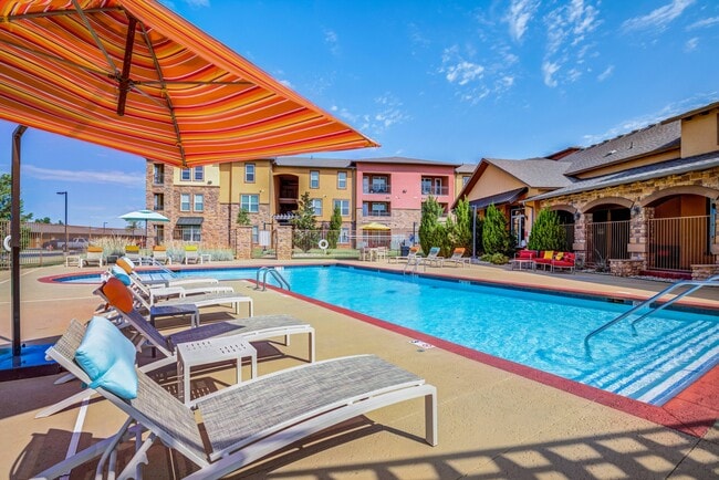 Poolside Lounge Area - The Retreat at Quail North Apartments