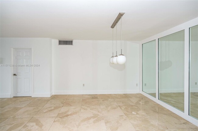 Building Photo - 5701 Collins Ave
