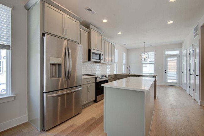 Building Photo - Brand New Townhome in Loso Terraces | 3 Be...