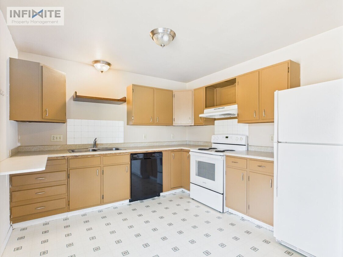 Foto principal - 4 Bedroom Near Downtown!
