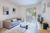 Located at 3115 Finnian Way in Dublin, CA, this thoughtfully designed one-bedroom, one-bathroom residence offers an efficient and comfortable single-floor layout. The combined living and dining area forms the heart of the home, featuring soft carpeting, neutral walls, and a sliding glass door that floods the space with natural light while providing direct access to a private patio with outdoor views. The open pass-through between the kitchen and living area enhances the sense of connectivity throughout.

The galley-style kitchen is well-appointed with light wood cabinetry extending to the ceiling for ample storage, a double-basin sink, light countertops, tile flooring, and a full suite of white appliances including a refrigerator, gas range, dishwasher, and microwave. A dedicated laundry area and utility room add practical convenience.

The spacious primary bedroom offers generous proportions, plush carpet, and multiple windows dressed with vertical blinds, providing excellent natural light and privacy. Two closets provide substantial storage. The bathroom includes a full tub-shower combination with tile flooring. A hallway and entrance complete the well-organized floor plan, making this a functional and inviting residence.
