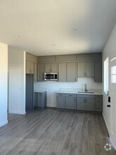 Building Photo - 9308 E Ave T 6