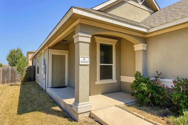 Building Photo - 6300 Garden Rose Path