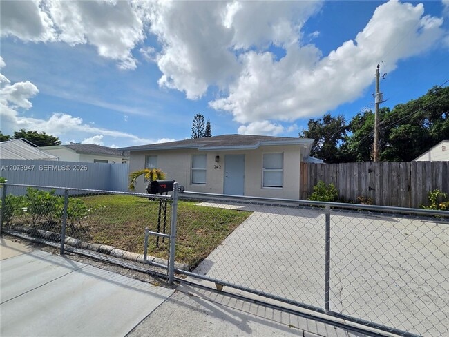 Building Photo - 242 NW 51st Ave