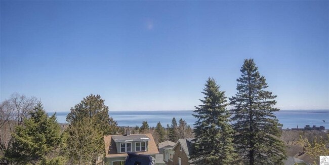 Building Photo - AVAILABLE JUNE 1ST- Terrific 3 Bed 2 Bath w/ Lake Views